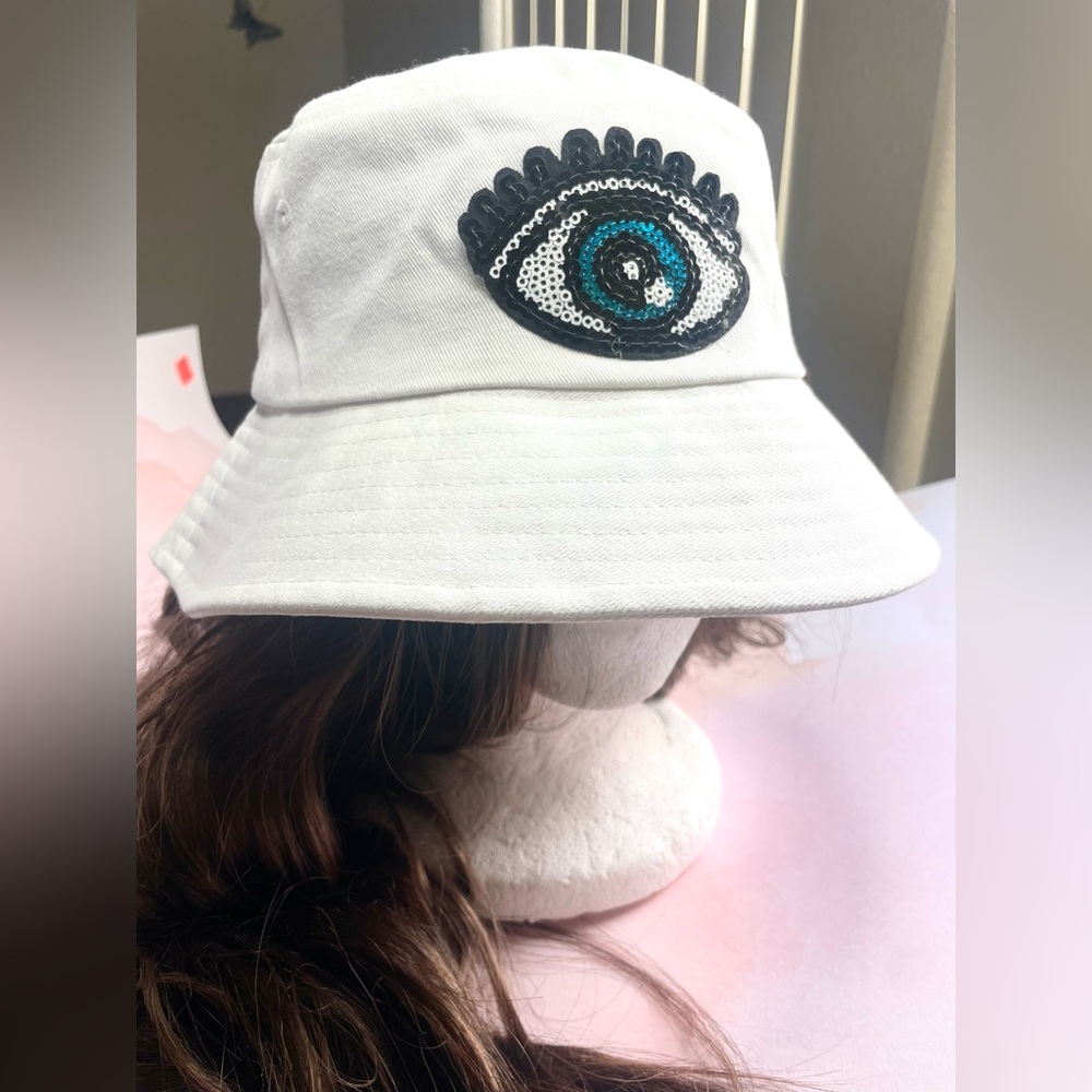Bucket style hat women’s sun white hat with blue eye patch
